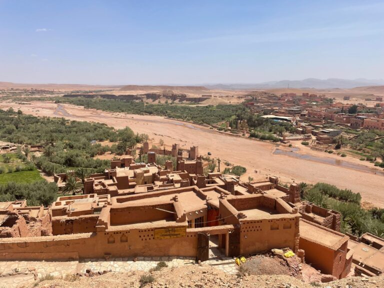 6 Day Desert Tour From Marrakech,“Camel trek in Erg Chebbi dunes, Morocco desert tour.” “Kasbah Ait Ben Haddou on a 6-day Marrakech desert trip.” “Dades Gorge landscape during Morocco Sahara journey.” “Overnight desert camp under stars in Merzouga dunes.”,“6-day Morocco desert tour from Marrakech with High Atlas Mountains, Ouarzazate, and Sahara dunes.” “Camel trekking adventure in Erg Chebbi with overnight camp experience in Merzouga.” “Travel from Marrakech to Fes via Ait Ben Haddou, Todra Gorge, and Sahara desert.” “Atlas Mountains road trip to Morocco desert with kasbahs and gorges.“Guided 6-day Marrakech desert tour crossing the High Atlas Mountains, visiting Kasbah Ait Ben Haddou, Ouarzazate, Dades Valley, and ending with camel trek in Erg Chebbi Sahara dunes.” “Adventure through Morocco’s desert on a 6-day trip from Marrakech, featuring UNESCO kasbahs, Todra Gorge hikes, and overnight camping in Merzouga.” “Sahara desert experience in Morocco with camel ride, sand dunes, and starry night camp during 6-day tour from Marrakech