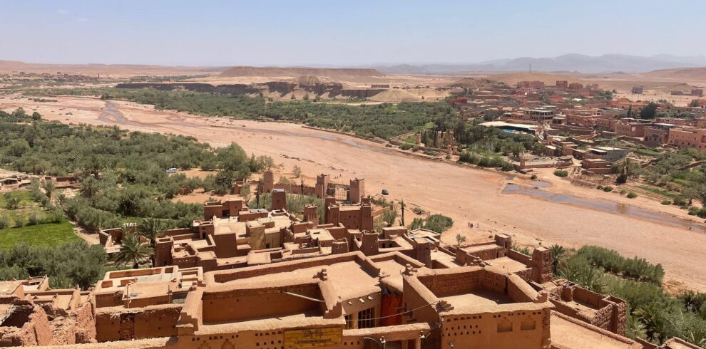 6 Day Desert Tour From Marrakech,“Camel trek in Erg Chebbi dunes, Morocco desert tour.” “Kasbah Ait Ben Haddou on a 6-day Marrakech desert trip.” “Dades Gorge landscape during Morocco Sahara journey.” “Overnight desert camp under stars in Merzouga dunes.”,“6-day Morocco desert tour from Marrakech with High Atlas Mountains, Ouarzazate, and Sahara dunes.” “Camel trekking adventure in Erg Chebbi with overnight camp experience in Merzouga.” “Travel from Marrakech to Fes via Ait Ben Haddou, Todra Gorge, and Sahara desert.” “Atlas Mountains road trip to Morocco desert with kasbahs and gorges.“Guided 6-day Marrakech desert tour crossing the High Atlas Mountains, visiting Kasbah Ait Ben Haddou, Ouarzazate, Dades Valley, and ending with camel trek in Erg Chebbi Sahara dunes.” “Adventure through Morocco’s desert on a 6-day trip from Marrakech, featuring UNESCO kasbahs, Todra Gorge hikes, and overnight camping in Merzouga.” “Sahara desert experience in Morocco with camel ride, sand dunes, and starry night camp during 6-day tour from Marrakech