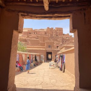 8 Day Desert Tour From Casablanca.A group of tourists riding camels in a single-file line across the orange sand dunes of the Sahara Desert near Merzouga, Morocco, under a clear blue sky.A knowledgeable guide explains the significance of landmarks, architecture, and streets.Access to narrow alleyways (medina lanes), hidden courtyards, and local spots that vehicles can't reach.,Walking through bustling souks (markets), past food stalls, and through public squares offers an authentic slice of daily life. The slow pace allows for photography, questions, and stopping to appreciate details you would otherwise miss. A narrow, cobblestone alleyway winding through the ancient medina with traditional Moroccan architecture.,A vibrant and crowded souk in Marrakech with stalls selling piles of colorful spices and traditional lanterns.,A diverse group of tourists on a walking tour listening to their guide explain the history of a building.,Close-up of detailed blue and white geometric mosaic tilework (zellij) on a historical Moroccan wall., Panoramic view from a rooftop overlooking the city of Fes, showcasing the sprawling medina and modern districts.,A visitor observes a skilled local artisan hand-weaving a traditional Berber carpet on a wooden loom.