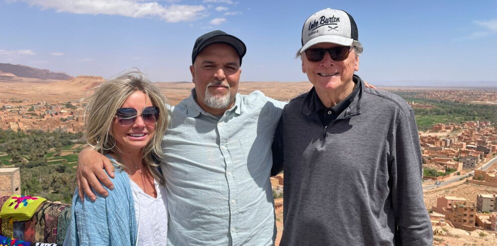 18-day desert tour from Casablanca/Travelers riding camels across the golden dunes of Merzouga during an 18-day Morocco desert tour from Casablanca, with scenic views of the Sahara at sunset.