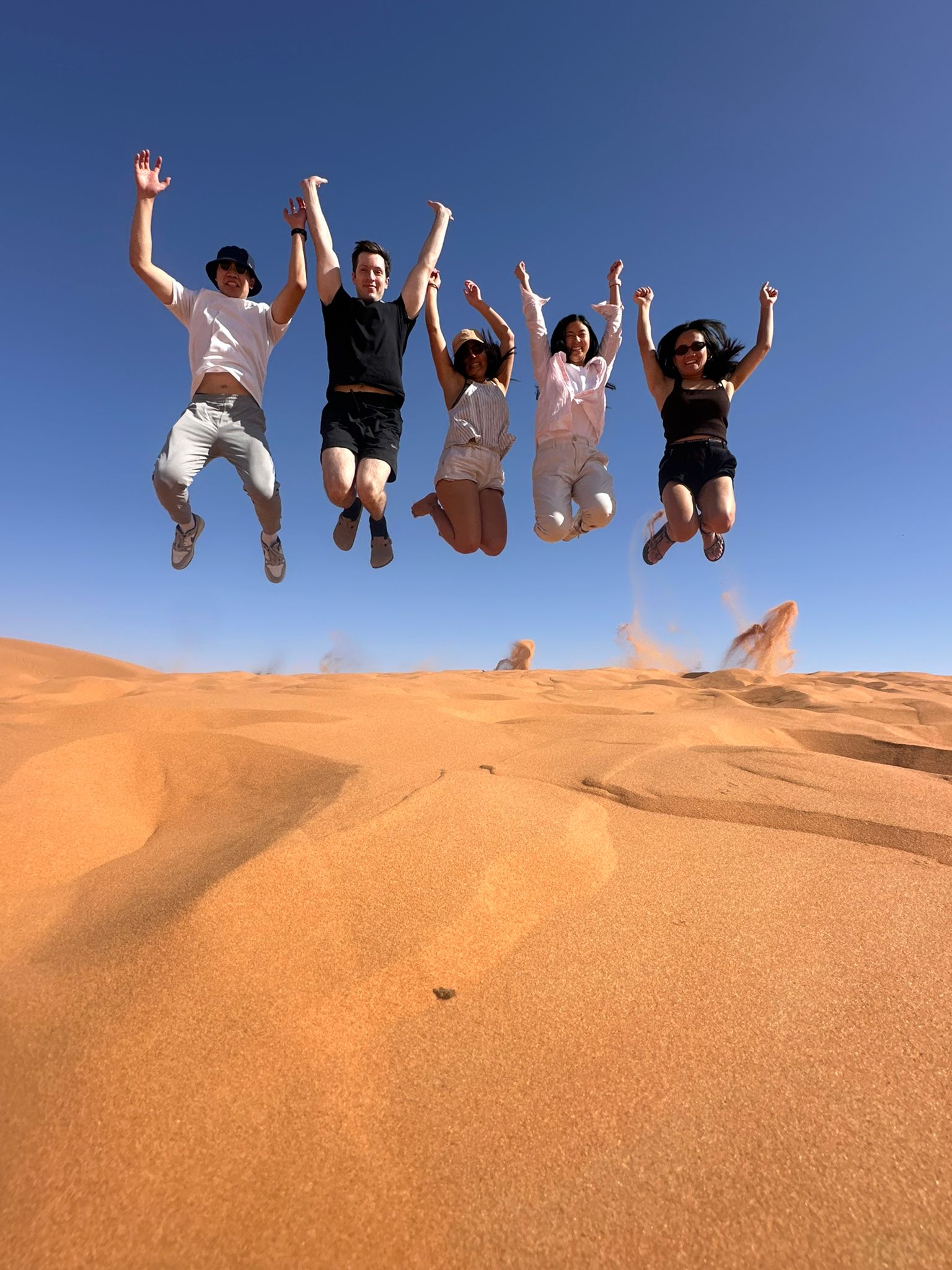 Camel trek at sunset in Erg Chebbi dunes